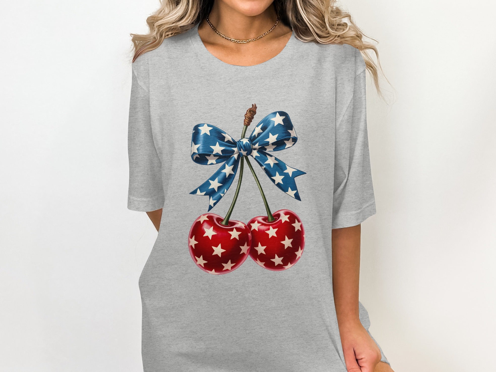 Cherry graphic with blue and white stars on a gray t-shirt.