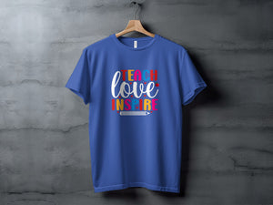 Blue t-shirt with "Teach love inspire" text and a pencil graphic.