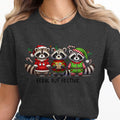 Three raccoons in festive holiday outfits with text "Feral But Festive".