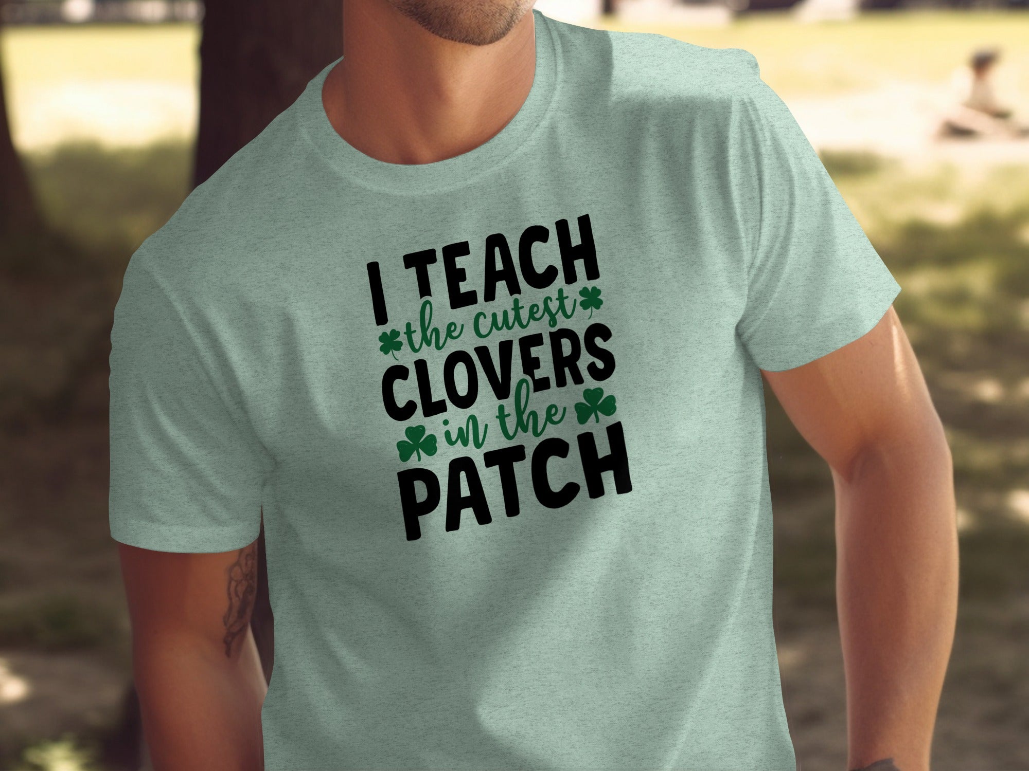 T-shirt with text "I TEACH the cutest CLOVERS in the PATCH".