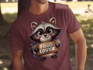 Maroon t-shirt with a cartoon raccoon holding a "Food Lover" sign.