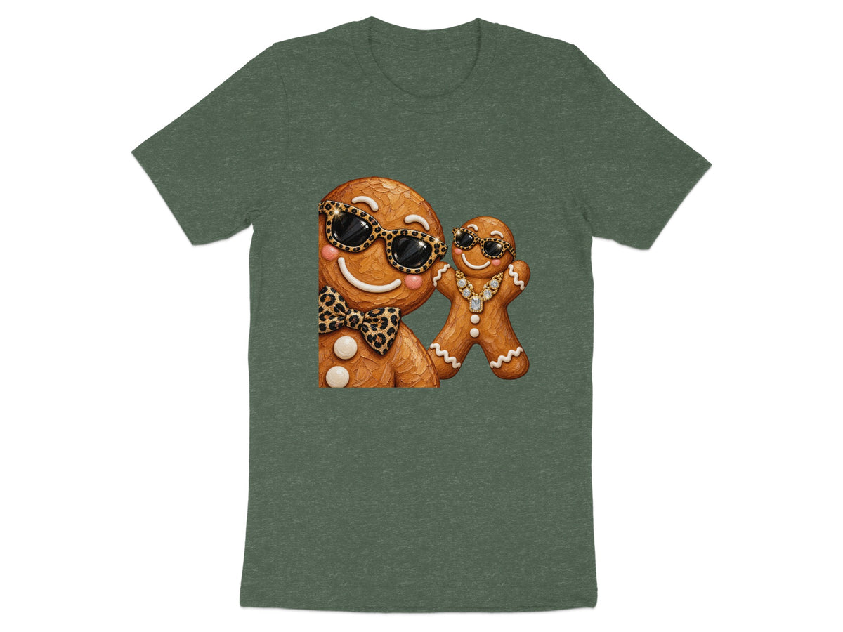 Two gingerbread cookies wearing sunglasses and jewelry on a green t-shirt.