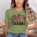 Green t-shirt with "SPOOKY SEASON" text featuring Halloween patterns and bats.