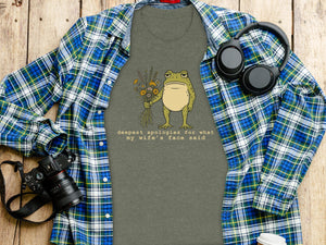 Gray t-shirt with cartoon frog holding flowers and text "deepest apologies for what my wife's face said".