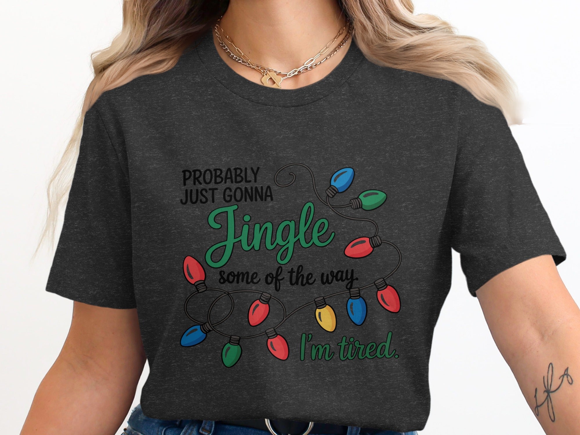 Dark gray t-shirt with "Probably just gonna Jingle some of the way. I'm tired." text.