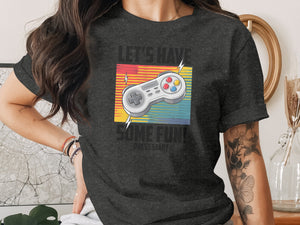 Dark t-shirt with retro-style gamepad, "Let's Have Some Fun! Press Start" text.
