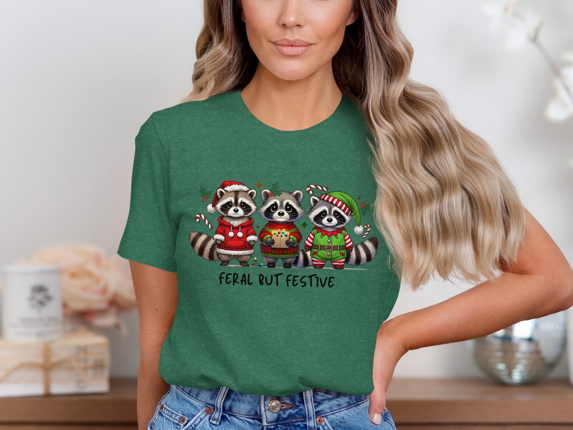 Three raccoons in Christmas attire with text "FERAL BUT FESTIVE".