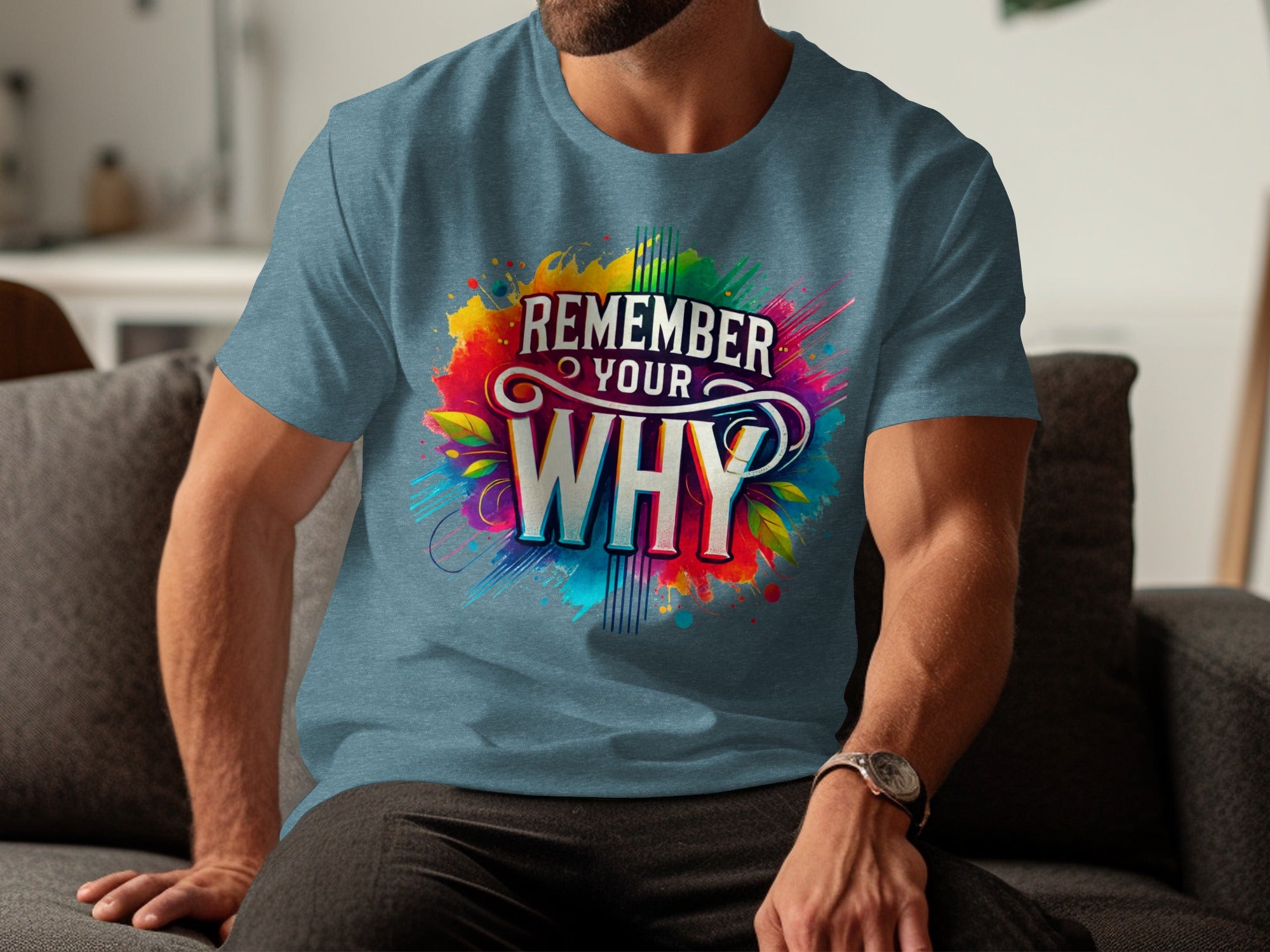 Blue t-shirt with "REMEMBER YOUR WHY" text surrounded by colorful splatters.