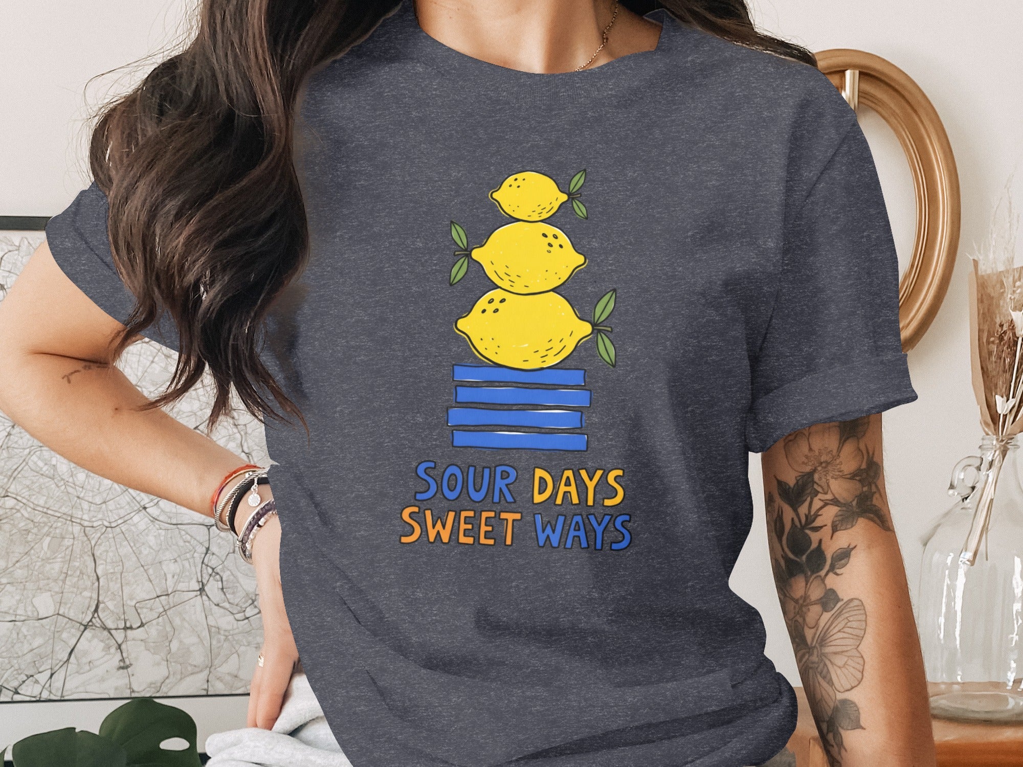 Dark gray t-shirt with stacked lemons graphic and text "Sour Days Sweet Ways".