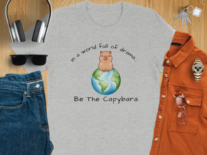 Grey t-shirt with a capybara on Earth and text "Be The Capybara".