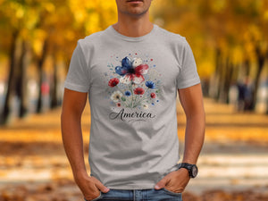 Grey t-shirt with a watercolor floral design featuring the word "America."