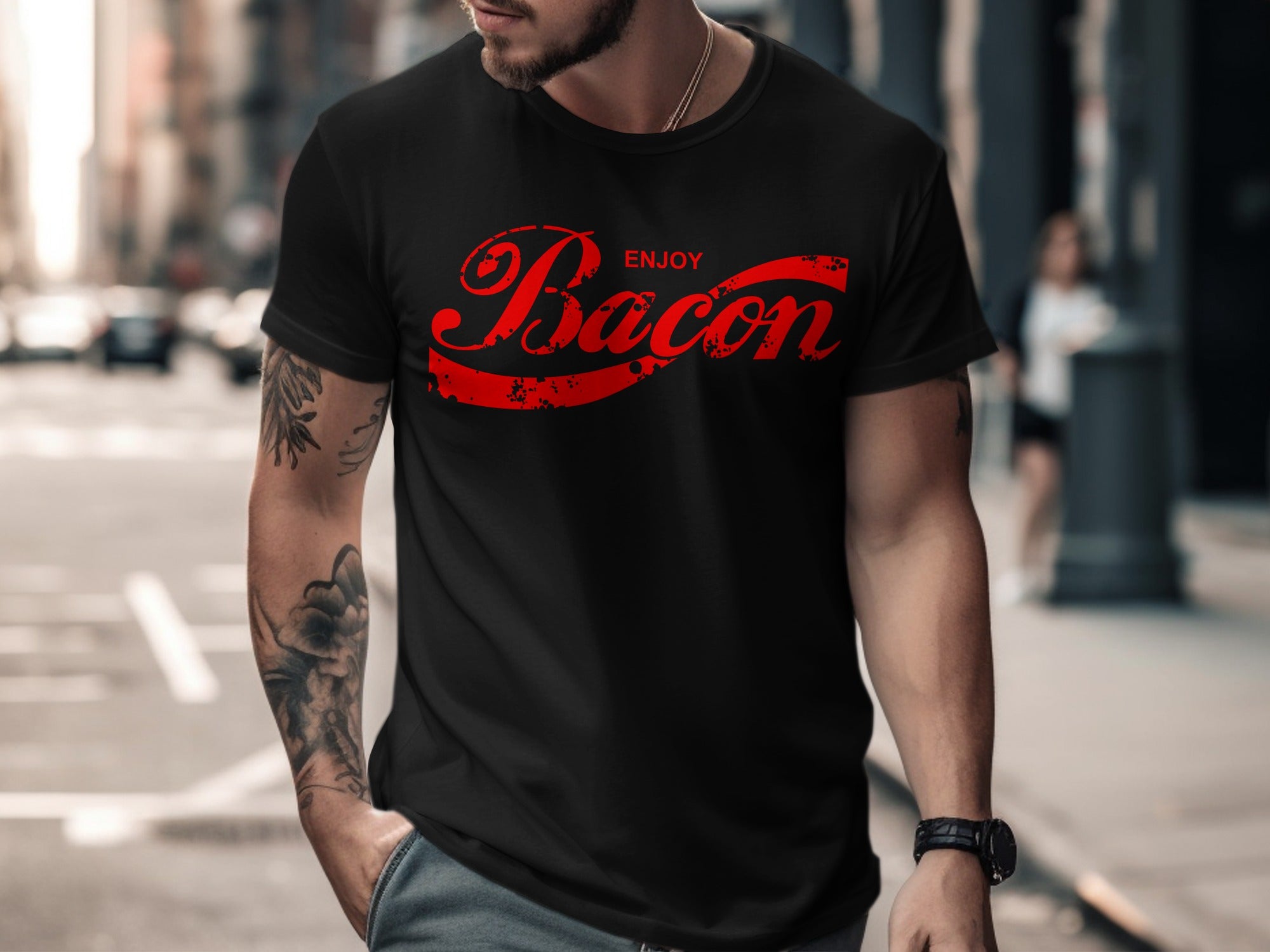 Black t-shirt with red distressed "Enjoy Bacon" text logo on the front.