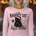 A woman wearing a pink long-sleeve shirt with a graphic of a disgruntled black cat tangled in Christmas lights wearing a Santa hat.