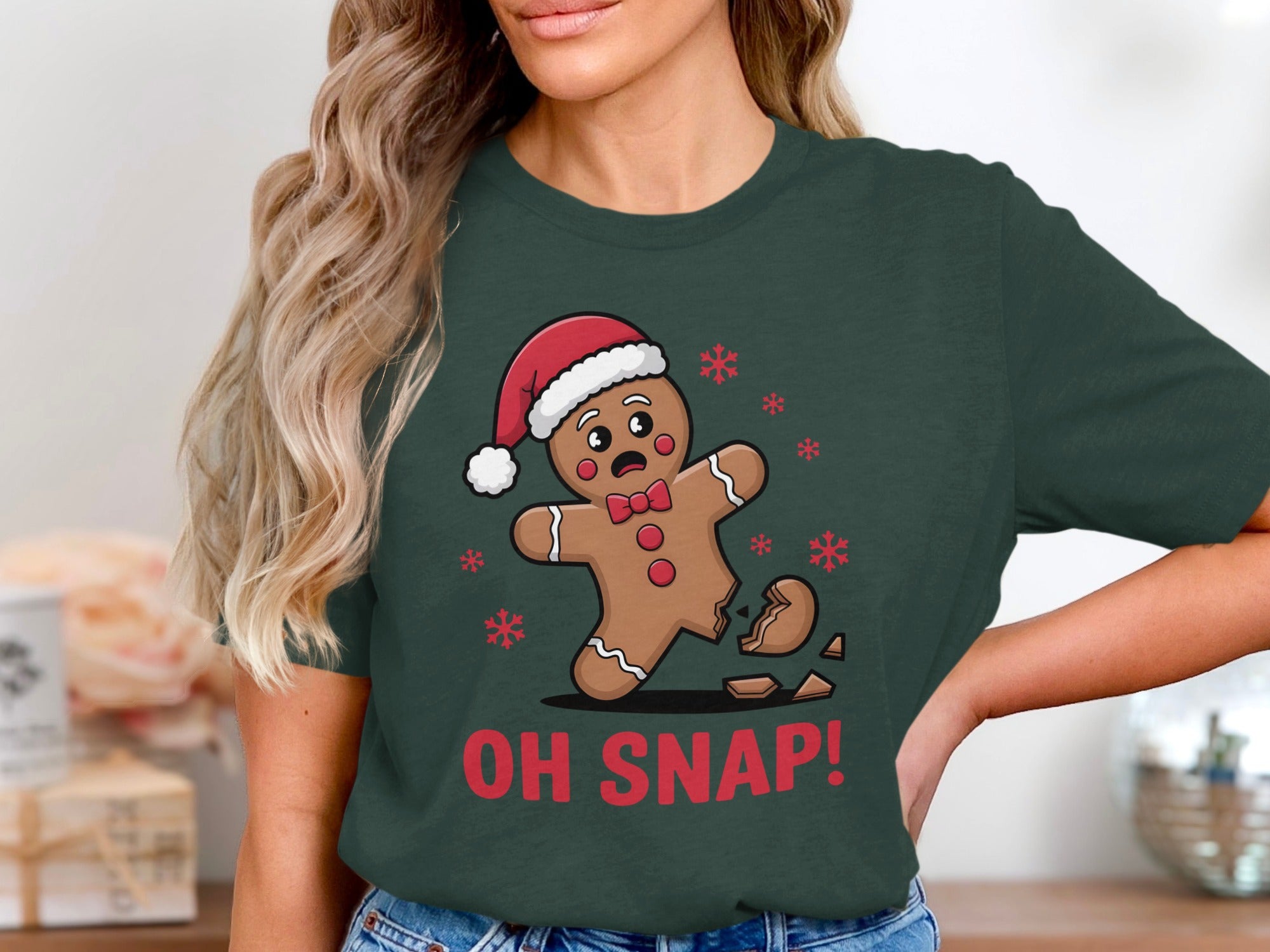 Gingerbread man with Santa hat, broken leg, and "OH SNAP!" text.