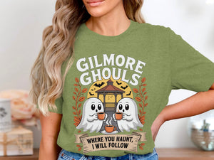Green t-shirt with "Gilmore Ghouls" and ghosts holding coffee cups.