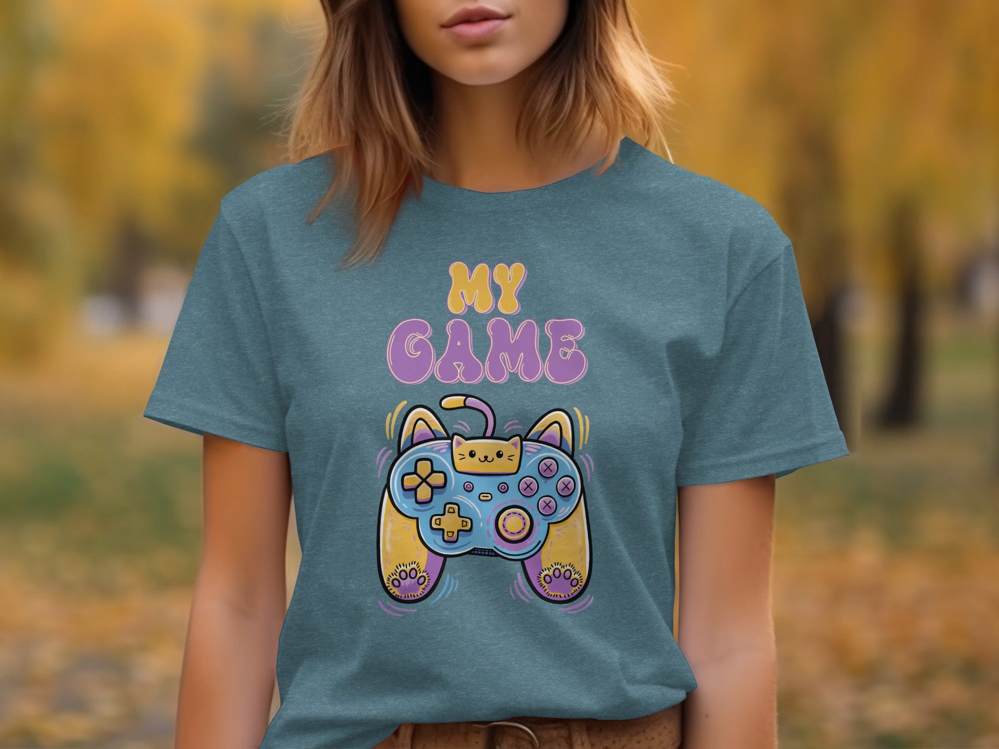 Teal t-shirt with "MY GAME" text and a cat-themed video game controller graphic.