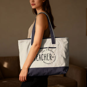 Canvas tote bag with "TEACHER" and "love, inspire, motivate, educate" text.