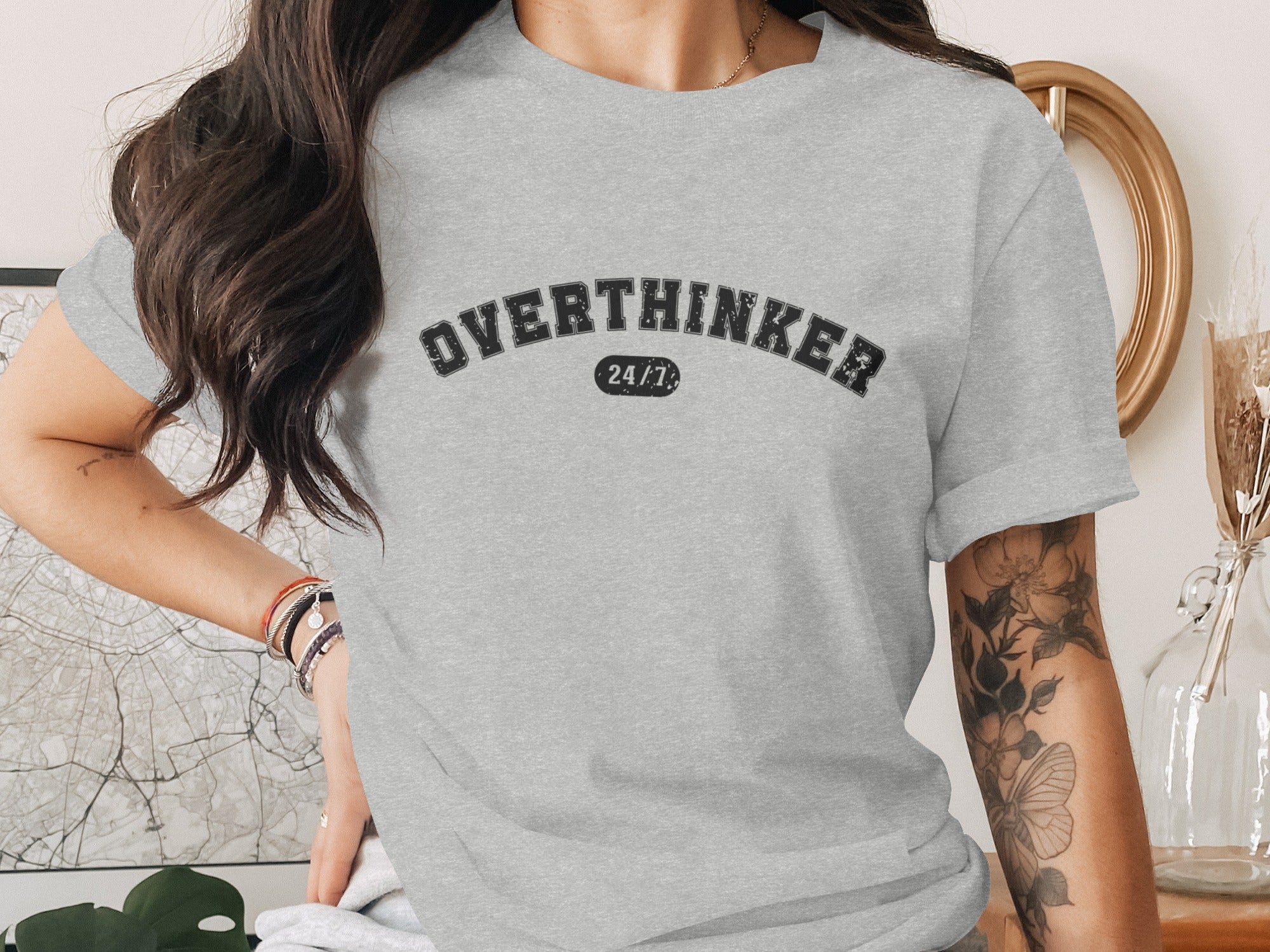 Grey t-shirt with "OVERTHINKER 24/7" text on the front.
