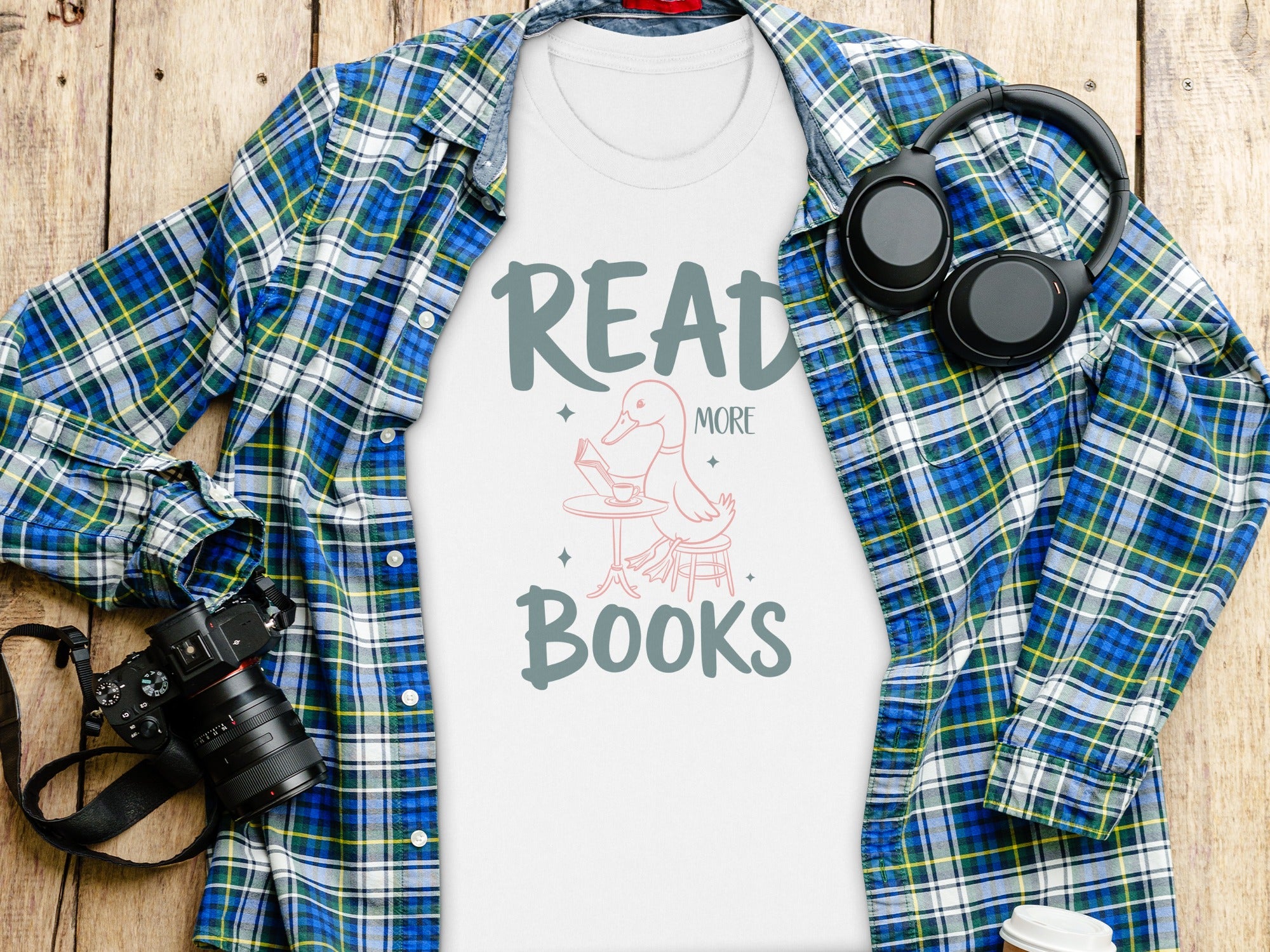 White t-shirt with "Read More Books" and a reading duck graphic.