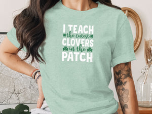 Mint t-shirt with white text reading "I TEACH the cutest CLOVERS in the PATCH".