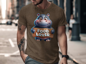 Brown t-shirt with a cartoon hippo holding a "FOOD LOVER" sign.
