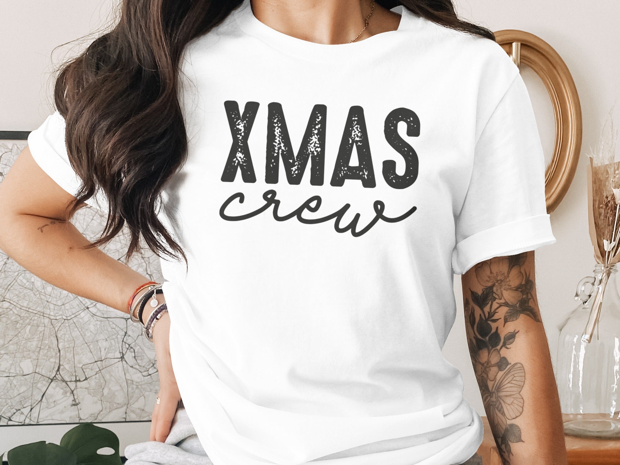 White t-shirt with distressed black text reading "XMAS crew".