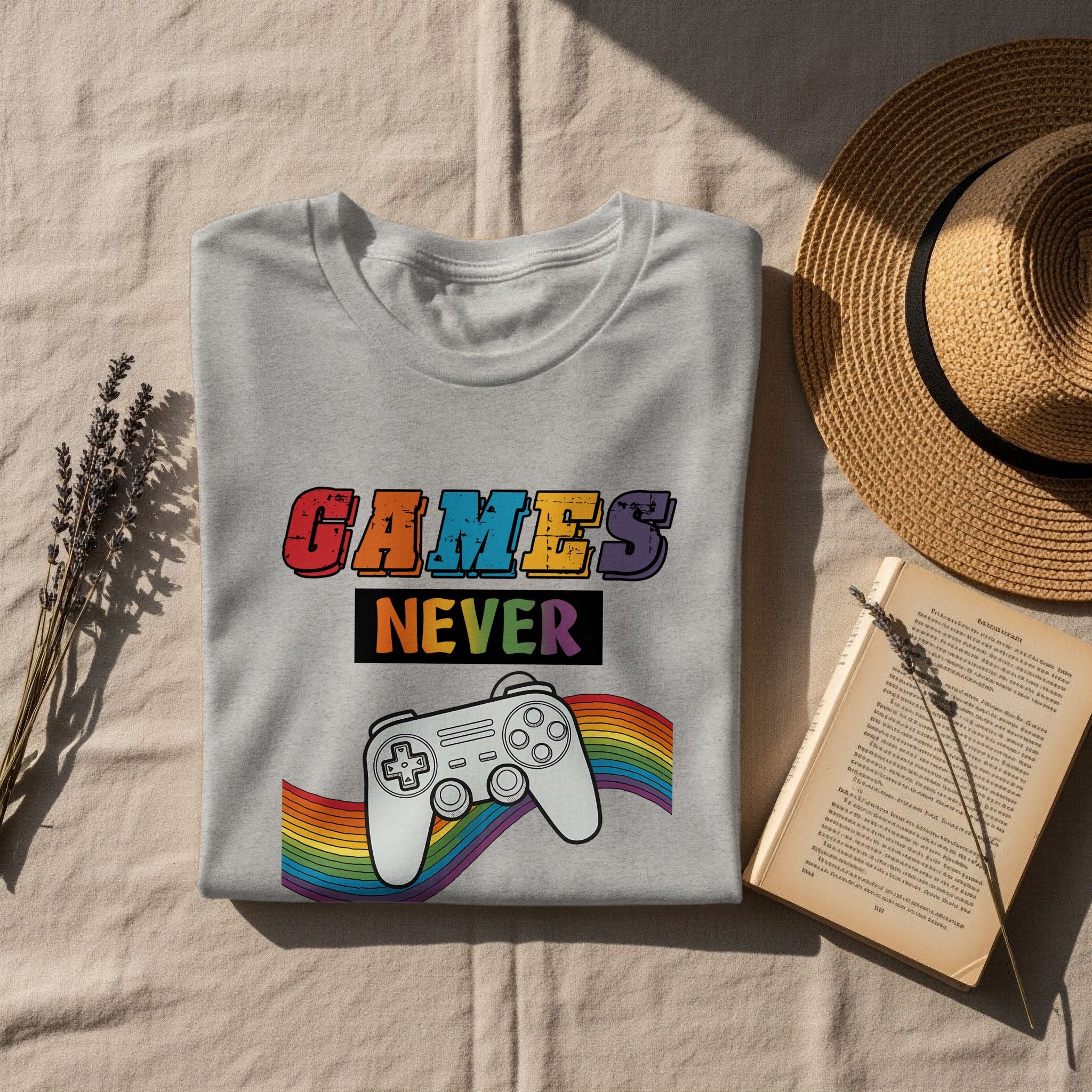 Grey t-shirt with colorful "GAMES NEVER" text and a video game controller.