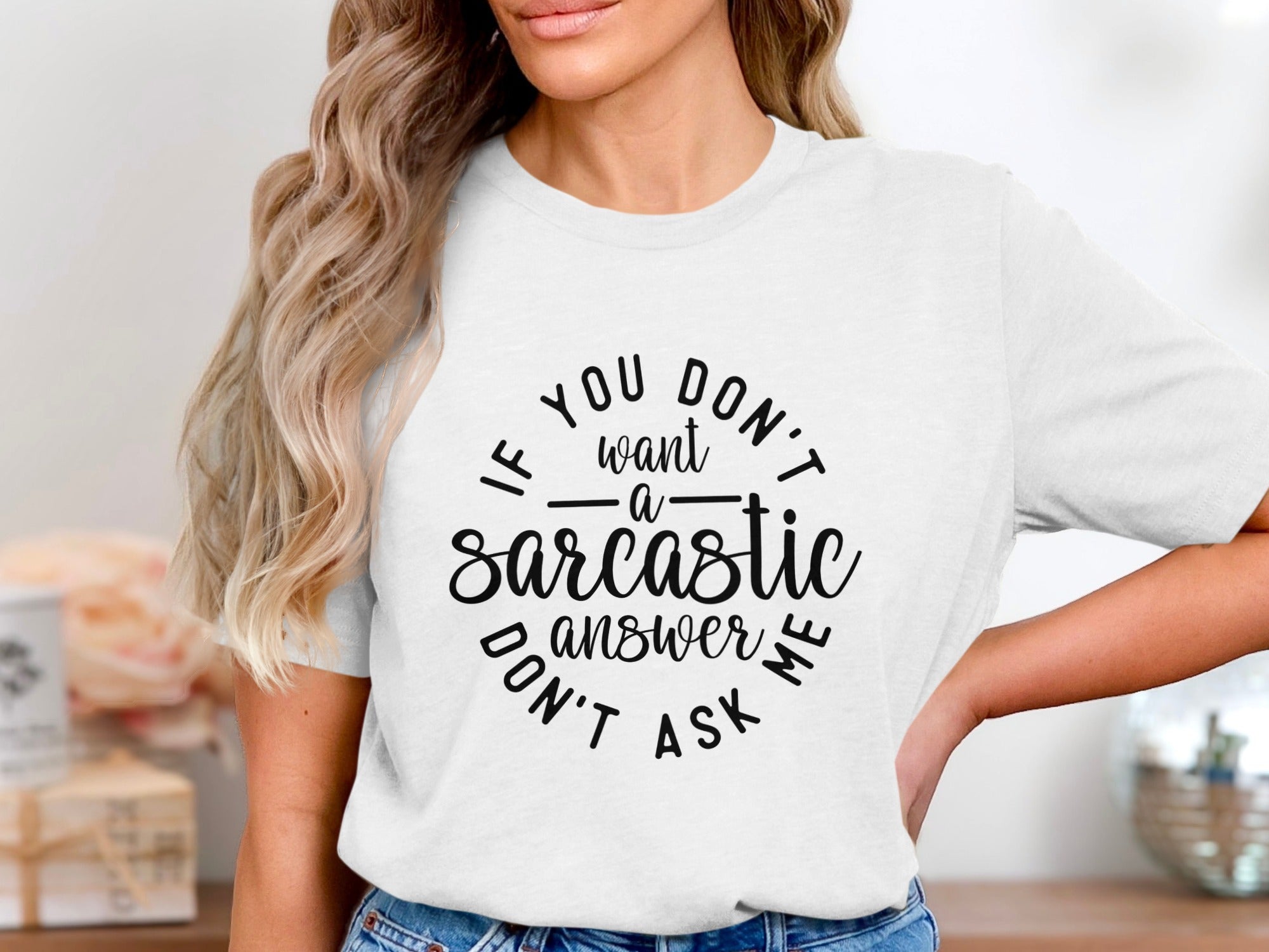 White t-shirt with black text "If you don't want a sarcastic answer don't ask me".