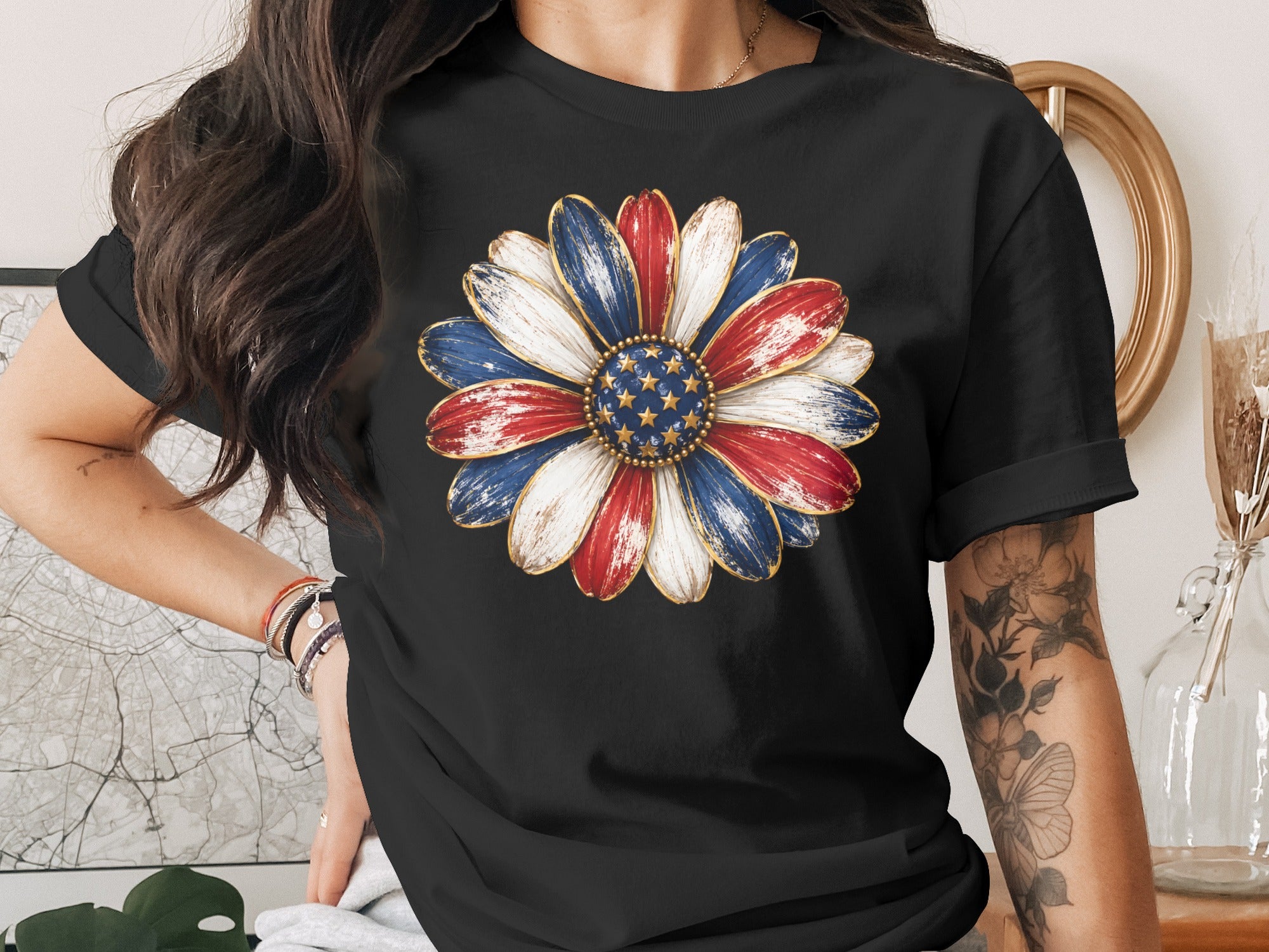 Black t-shirt with patriotic sunflower graphic on chest.