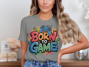 Grey t-shirt with colorful "BORN TO GAME" text and a blue video game controller.