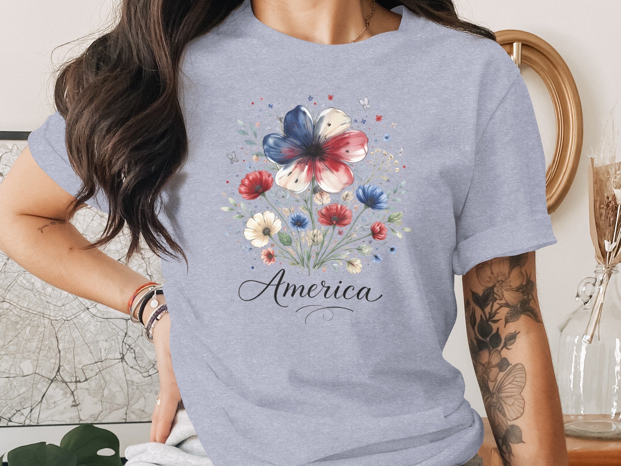 Gray t-shirt with floral print and the word "America" in cursive.