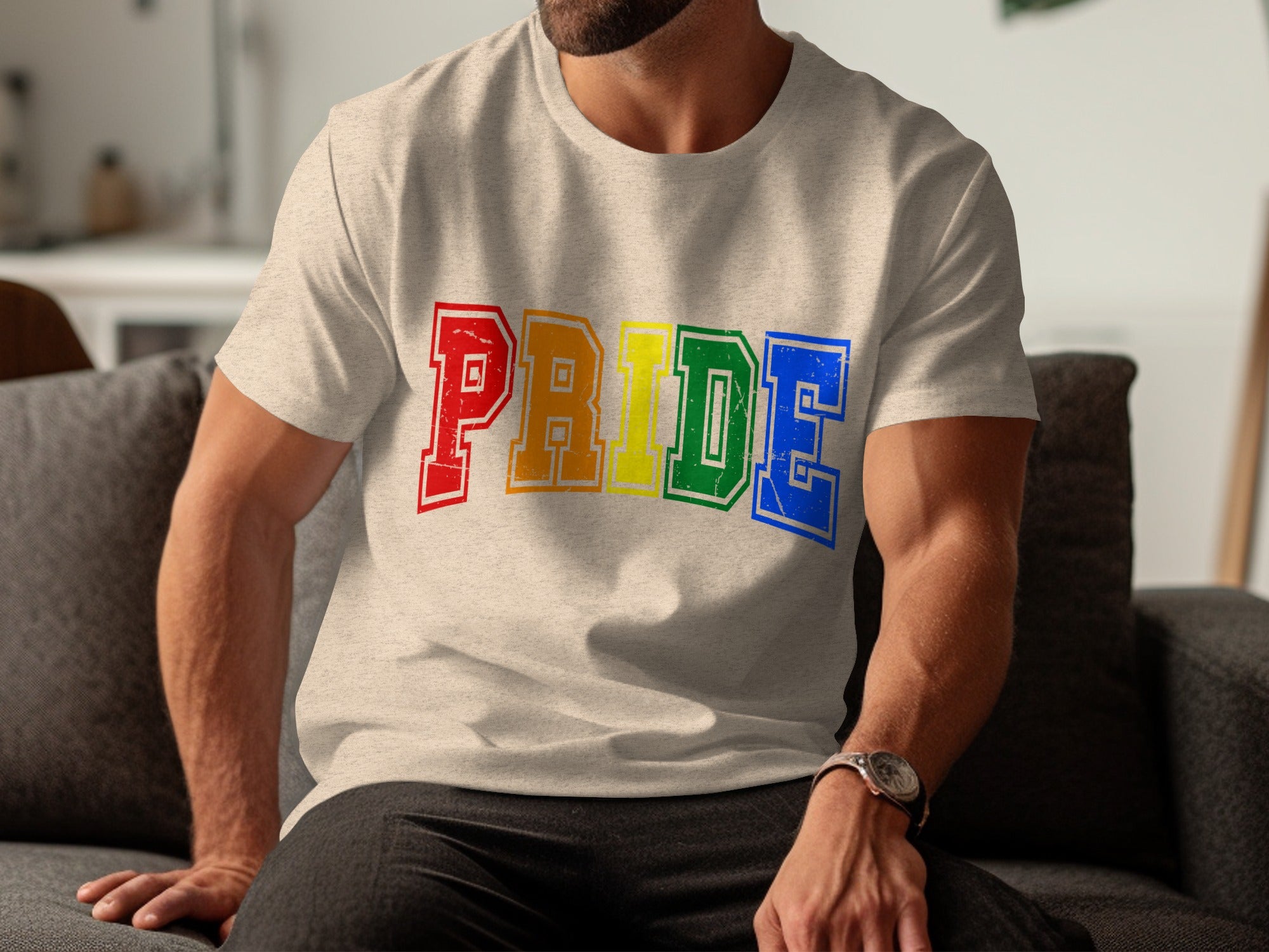 Light beige t-shirt with colorful "PRIDE" lettering