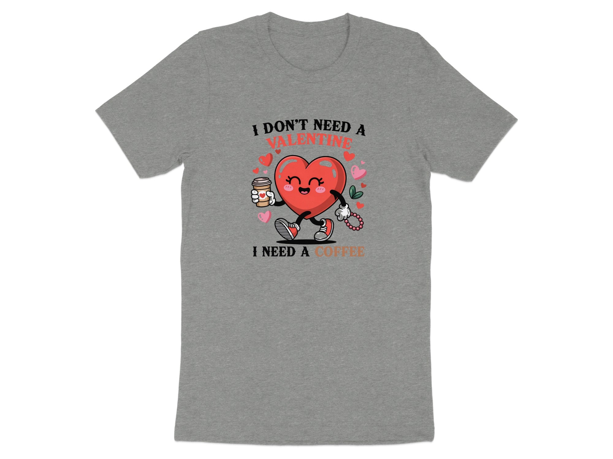 Grey t-shirt with a cartoon heart holding coffee, reading "I don't need a valentine I need a coffee."