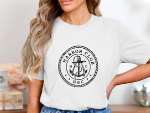 White t-shirt with black "Harbor Club HBC" logo featuring an anchor.