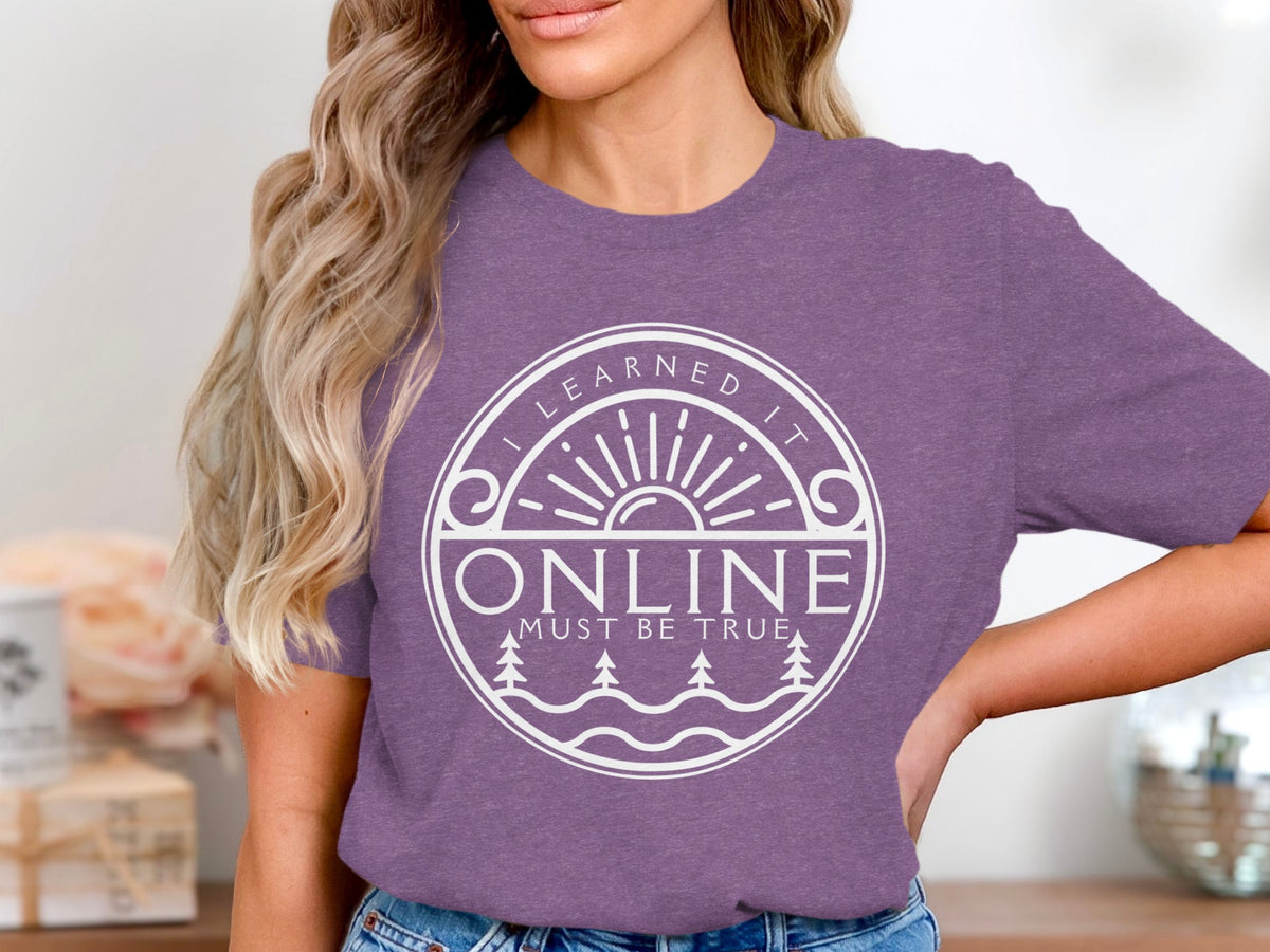 Purple t-shirt with "I LEARNED IT ONLINE MUST BE TRUE" graphic.