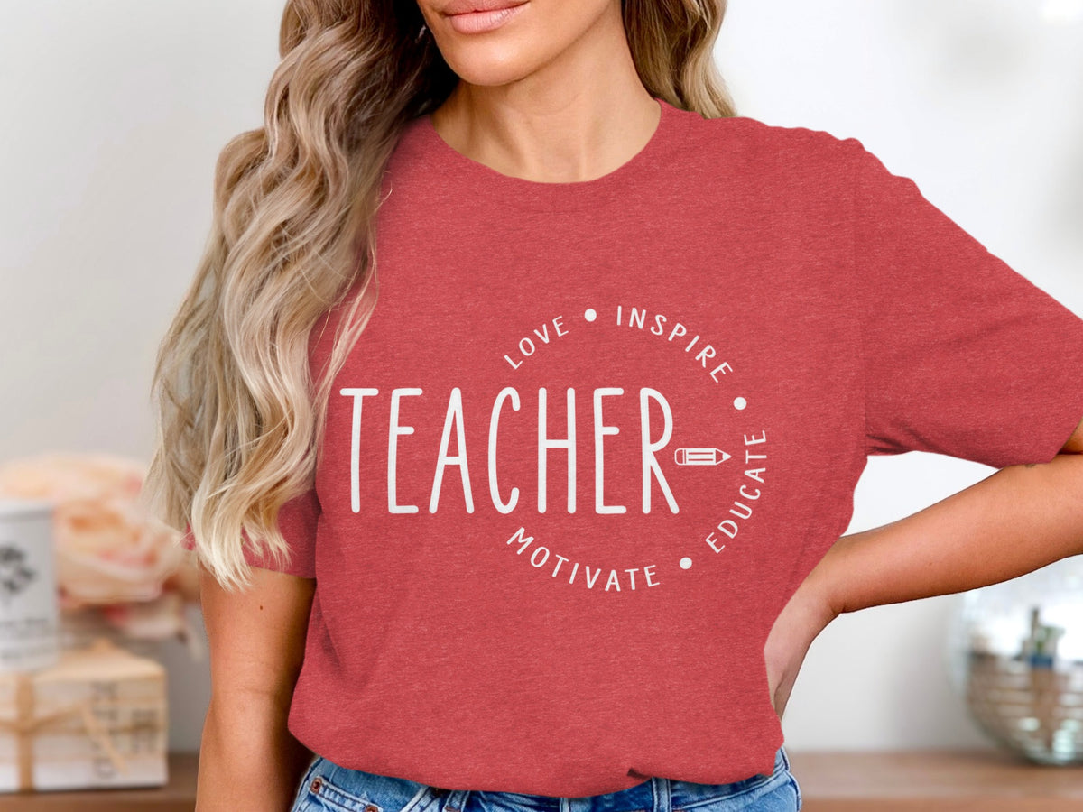 Red t-shirt with white text: TEACHER, LOVE, INSPIRE, MOTIVATE, EDUCATE, and a pencil icon.