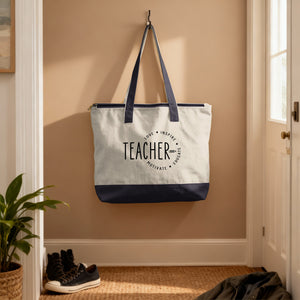 Teacher tote bag with love, inspire, educate, motivate text and pencil graphic.