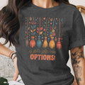 Dark t-shirt with colorful brooms and flowers, reads "A girl's gotta have OPTIONS!"