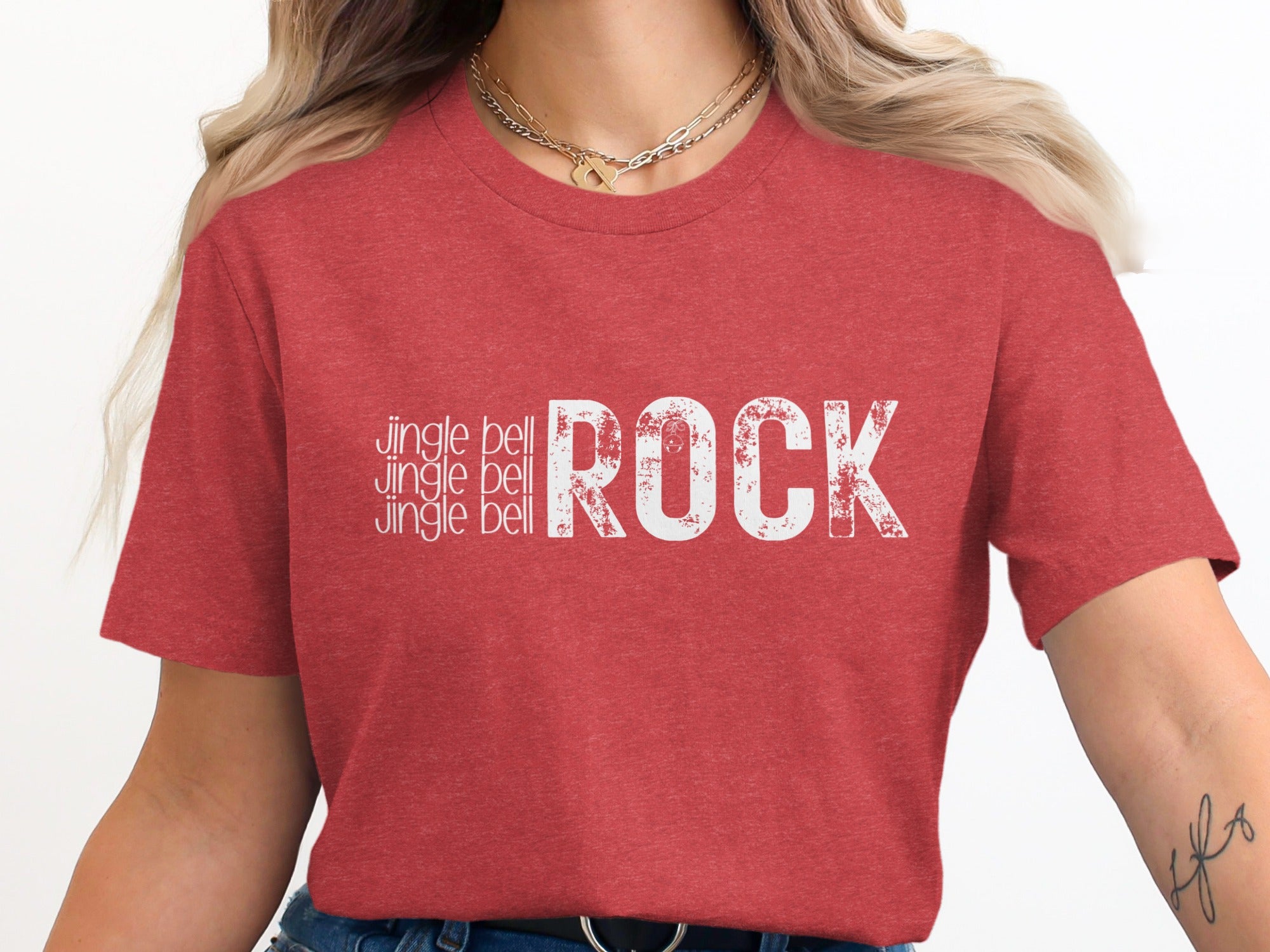 Red t-shirt with white text reading "jingle bell jingle bell ROCK"