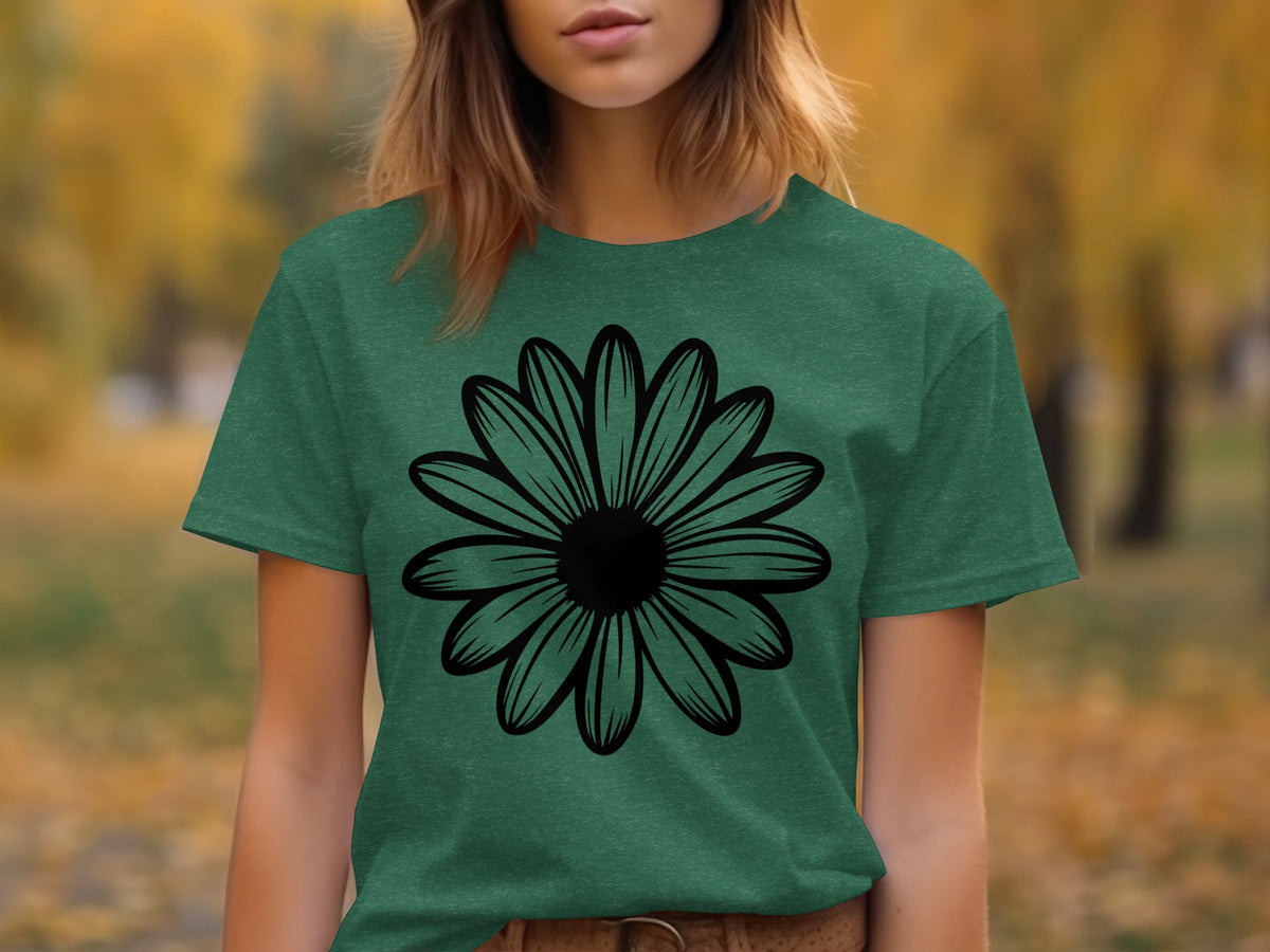 Green t-shirt with a black outline of a daisy graphic on the front.