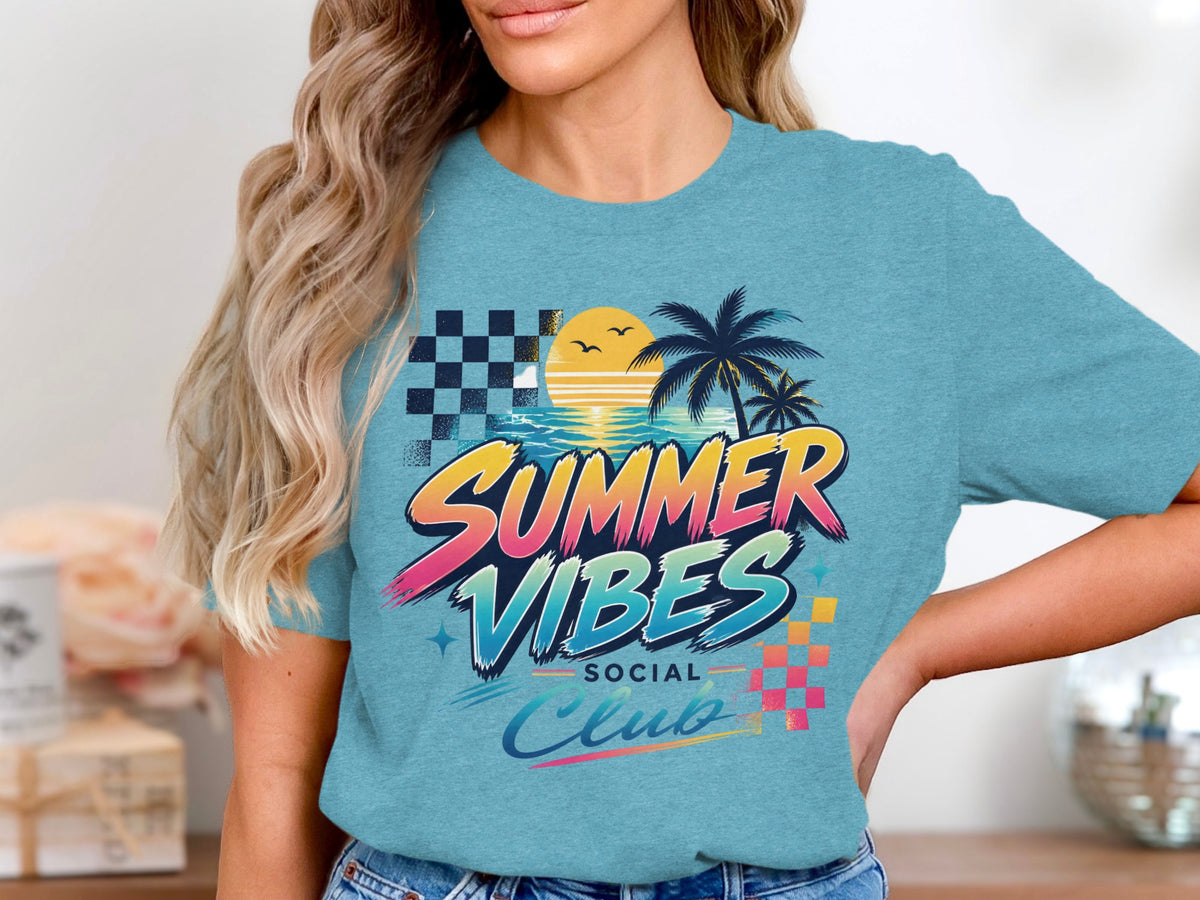 Blue t-shirt with "Summer Vibes Social Club" graphic featuring a sunset beach scene.