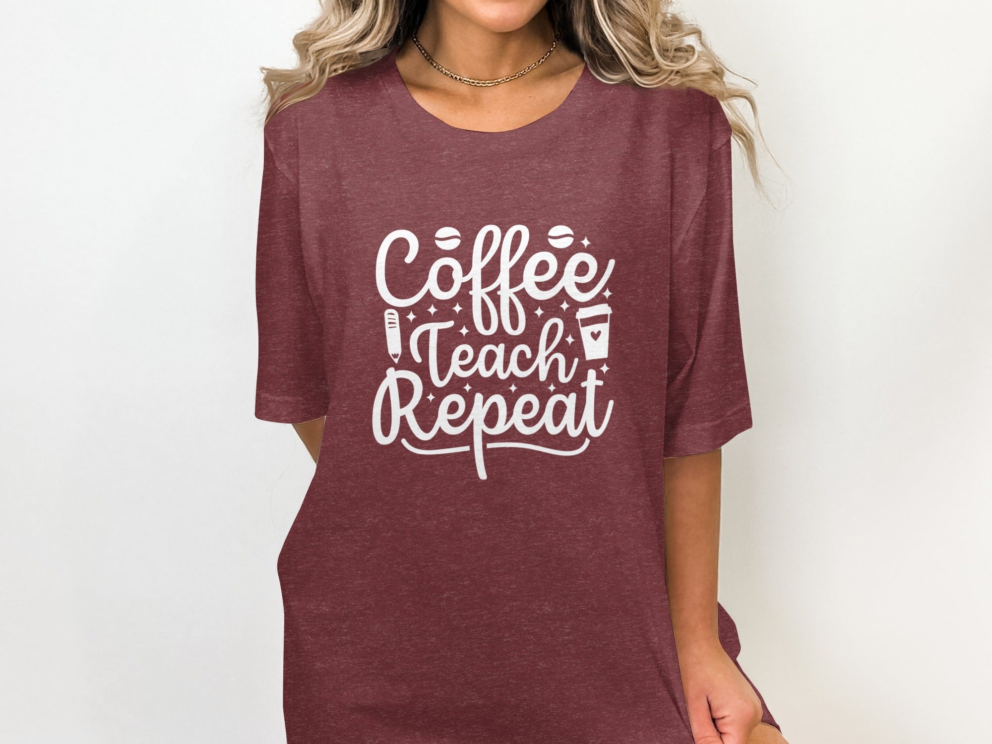 Maroon t-shirt with white text that reads "Coffee Teach Repeat".