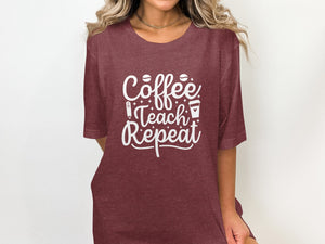 Maroon t-shirt with white text that reads "Coffee Teach Repeat".