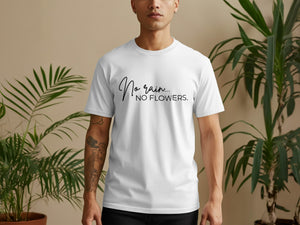 White t-shirt with black text "No rain... NO FLOWERS" in script.
