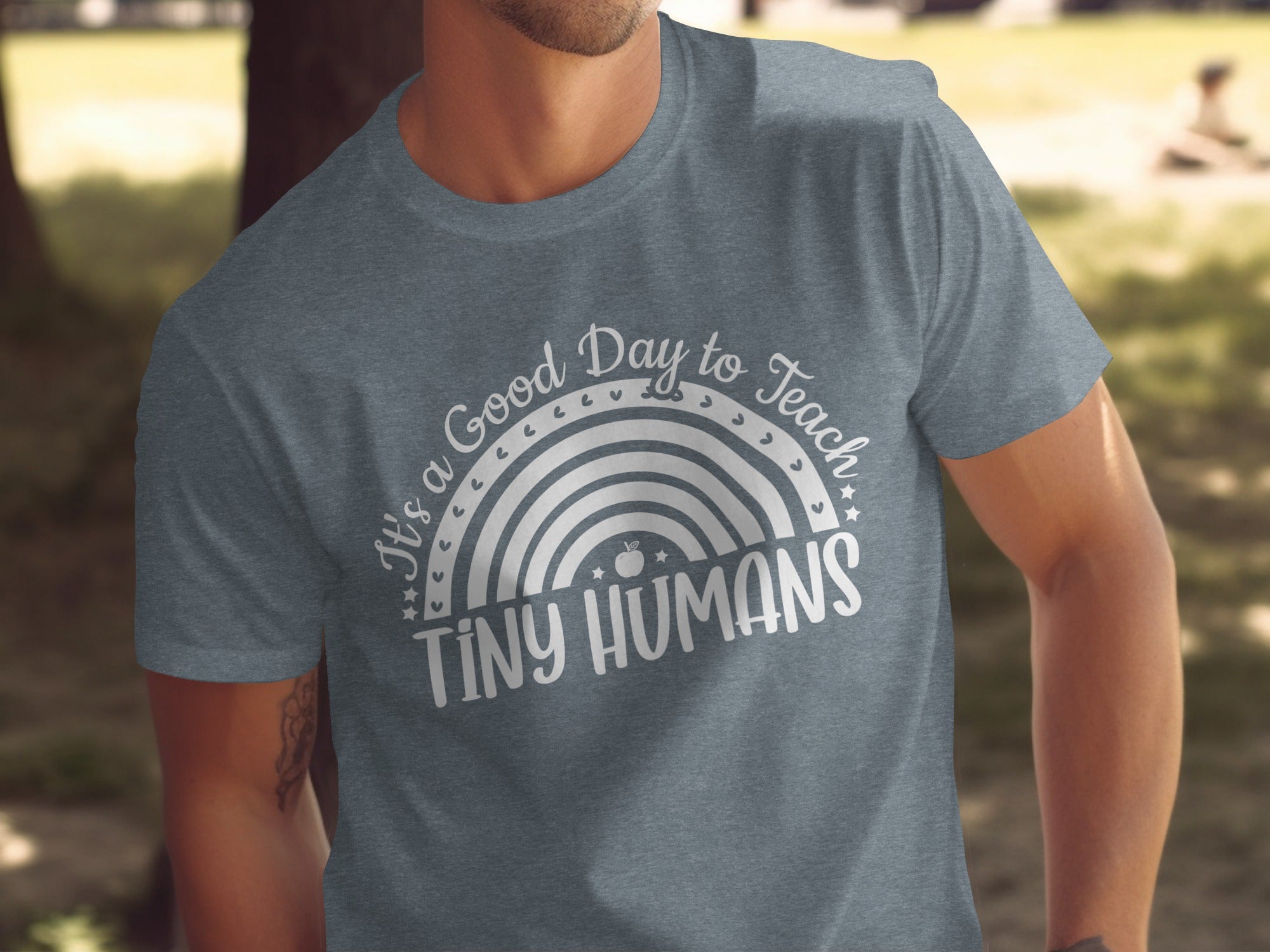 Grey t-shirt with white text "It's a Good Day to Teach Tiny Humans".