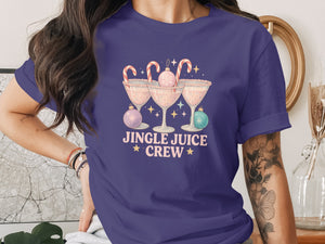 Jingle Juice Crew graphic on a purple t-shirt with martini glasses and ornaments.