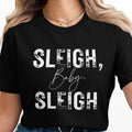 Black t-shirt with white distressed text reading "Sleigh, Baby, Sleigh".
