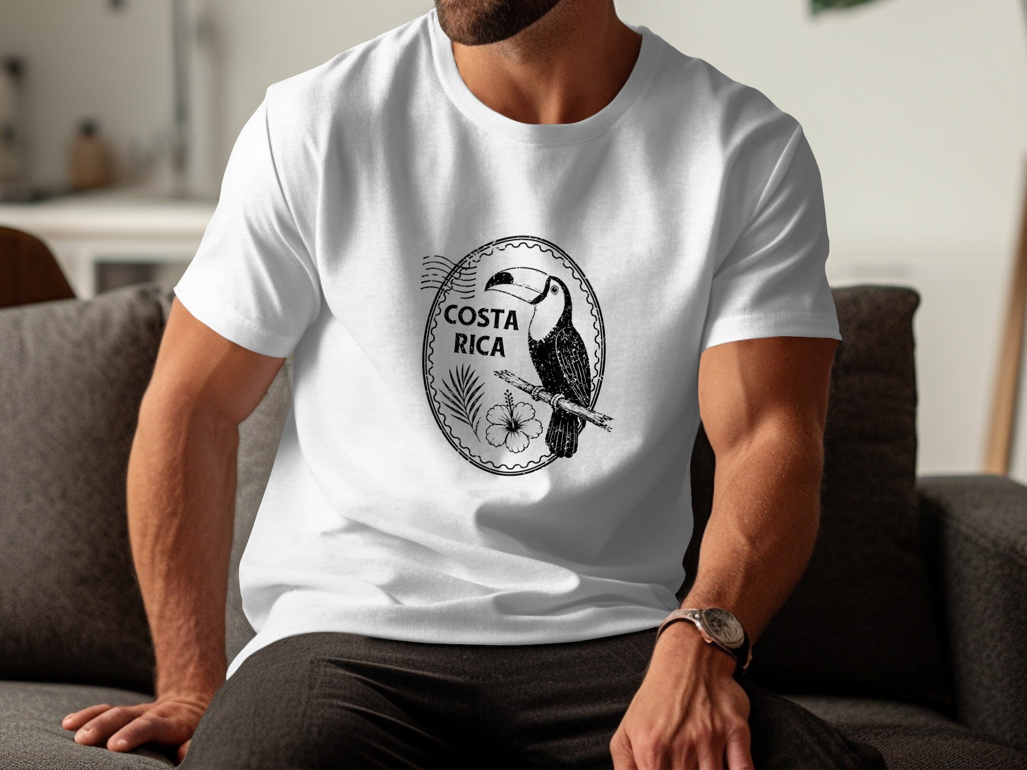 White t-shirt with black graphic of toucan, flower, and "Costa Rica" text.