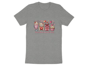 Gray t-shirt with teddy bear, gifts, and sweets design and text "LOVE MORE WORRY LESS".