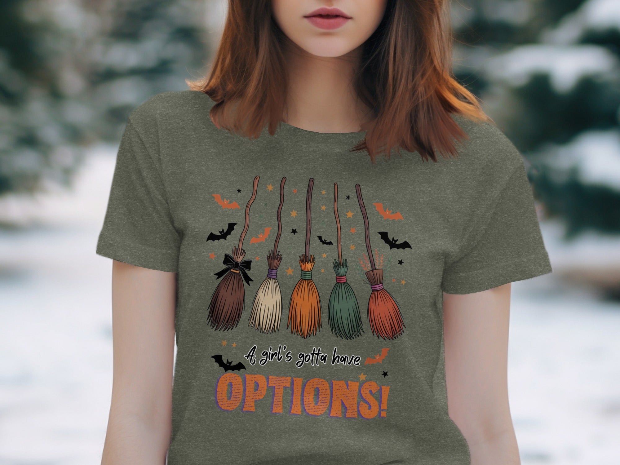 T-shirt with five brooms and the text "A girl's gotta have OPTIONS!"